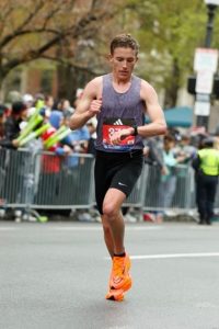 Nick participating in the Boston Marathon
